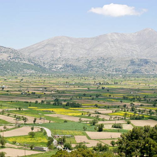 "View from Dicti Cave, 3.000 ft up to the West slope Lassithi Plateau."